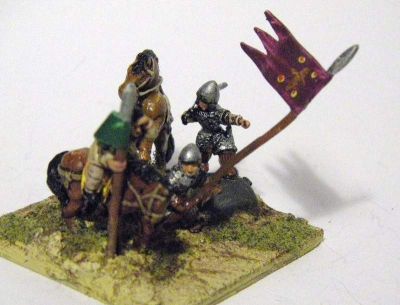 Norman General
one extra horseman added to what is sold as a mini diorama, complete with rock. Code :  VIK COM 8 - William II (William Rufis) 1087 â€“ 1100 William standing on large rock pointing, sword in hand, Un-armoured groom hanging from Williamâ€™s rearing horse (two piece casting), and AN 43(N) standard bearer (plus extra figure)
Keywords: Norman