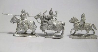 Arab Ghilman Cavalry Compared
Ghilman cavalry from 3 manufacturers. Right - Khurasan Miniatures figure code KM1 (comes with separate arm not yet attached), Left - Outpost code C11 (one piece casting with lance, comes with separate bowcase and shield, not attached), Center - Museum Miniatures code PR05 (one piece casting with bow)
Keywords: arab seljuk abbasid ayyubid mamluk