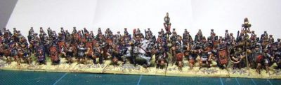 Early Imperial Roman Legionaries
Old Glory legionaries with Donnington, Corvus Belli and Essex officers and LBMS shield transfers. A rare "on the painting table" shot as they have not yet been matt varnished or had static grass added to the bases. 
Keywords: EIR