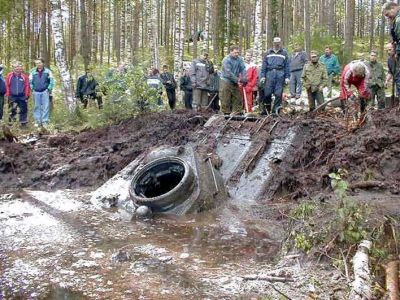 T34/76A recovered from an Estonian lake
T34/76A in German markings recovered (alledgedly in working order) from an Estonnian lake. Follow [url=http://www.englishrussia.com/?p=299]this link[/url] for the full story 
Keywords:  Russian German